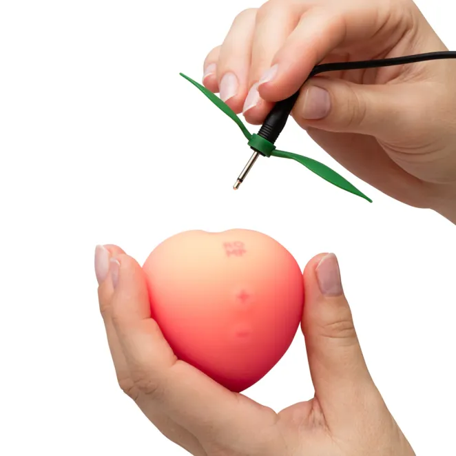 ROMP Peach Toy Rechargeable Clitoral Stimulator